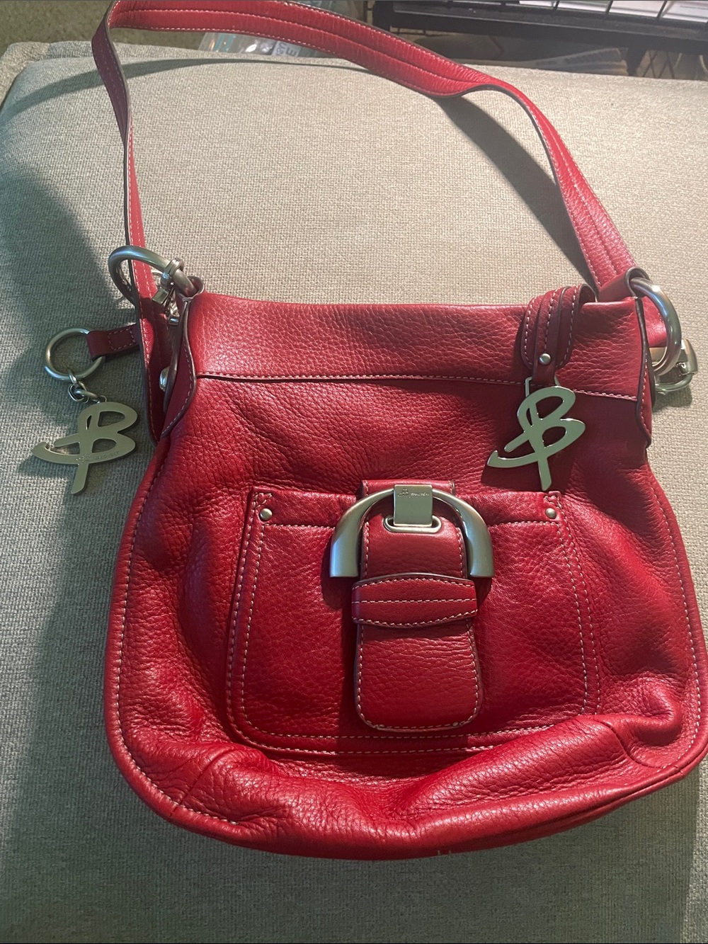 B. Makowsky Red $100 Leather Shoulder Bag with Decorative Logo Charms